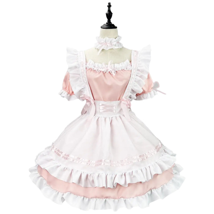 Pink and white ruffled dress on a mannequin against a gray background