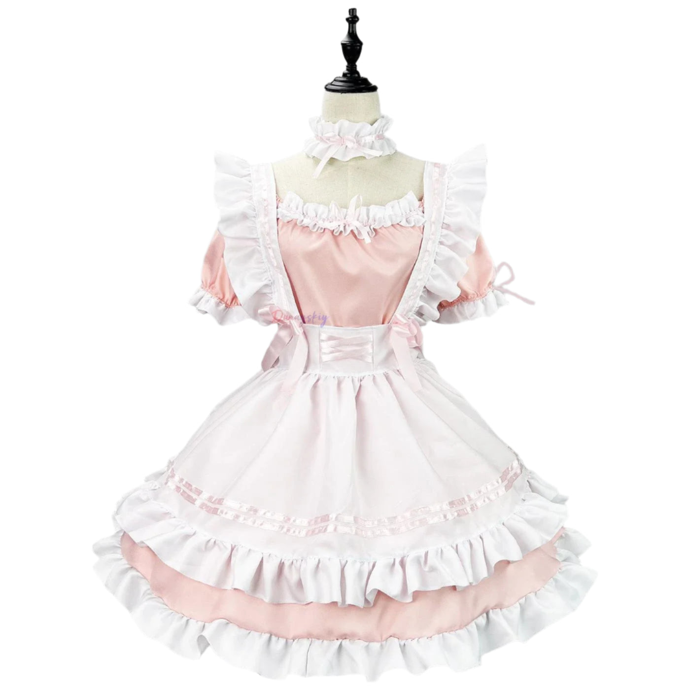 Pink and white ruffled dress on a mannequin against a gray background