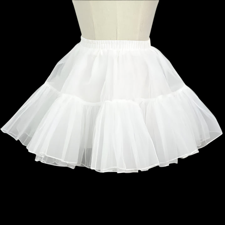 White petticoat on a mannequin against a black background with 'hemera store' branding.