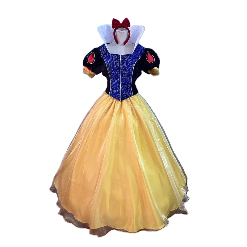 Costume dress with blue bodice and yellow skirt on a mannequin against a blue wall.