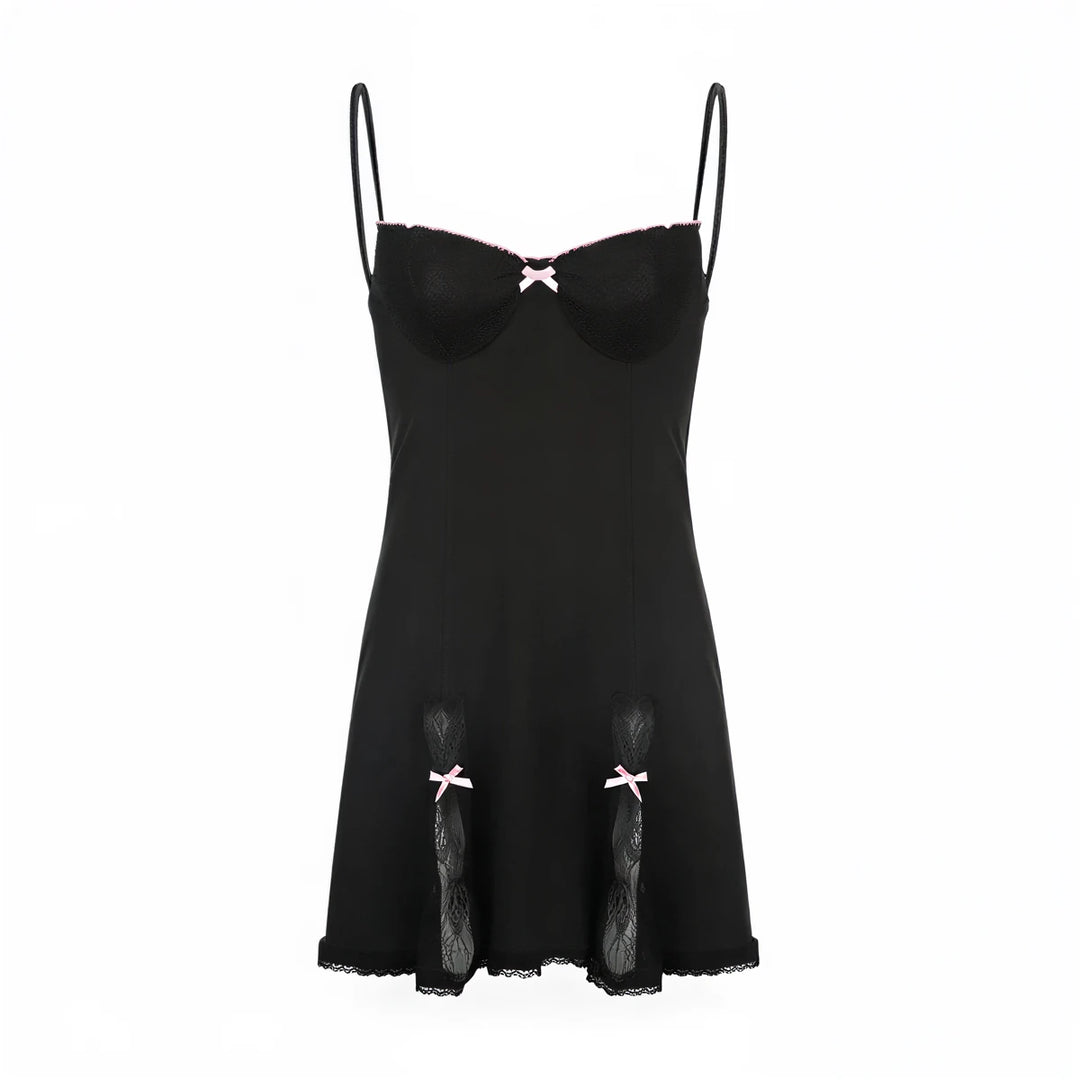 Black lace-trimmed sundress with pink bow accents at bust and hem.