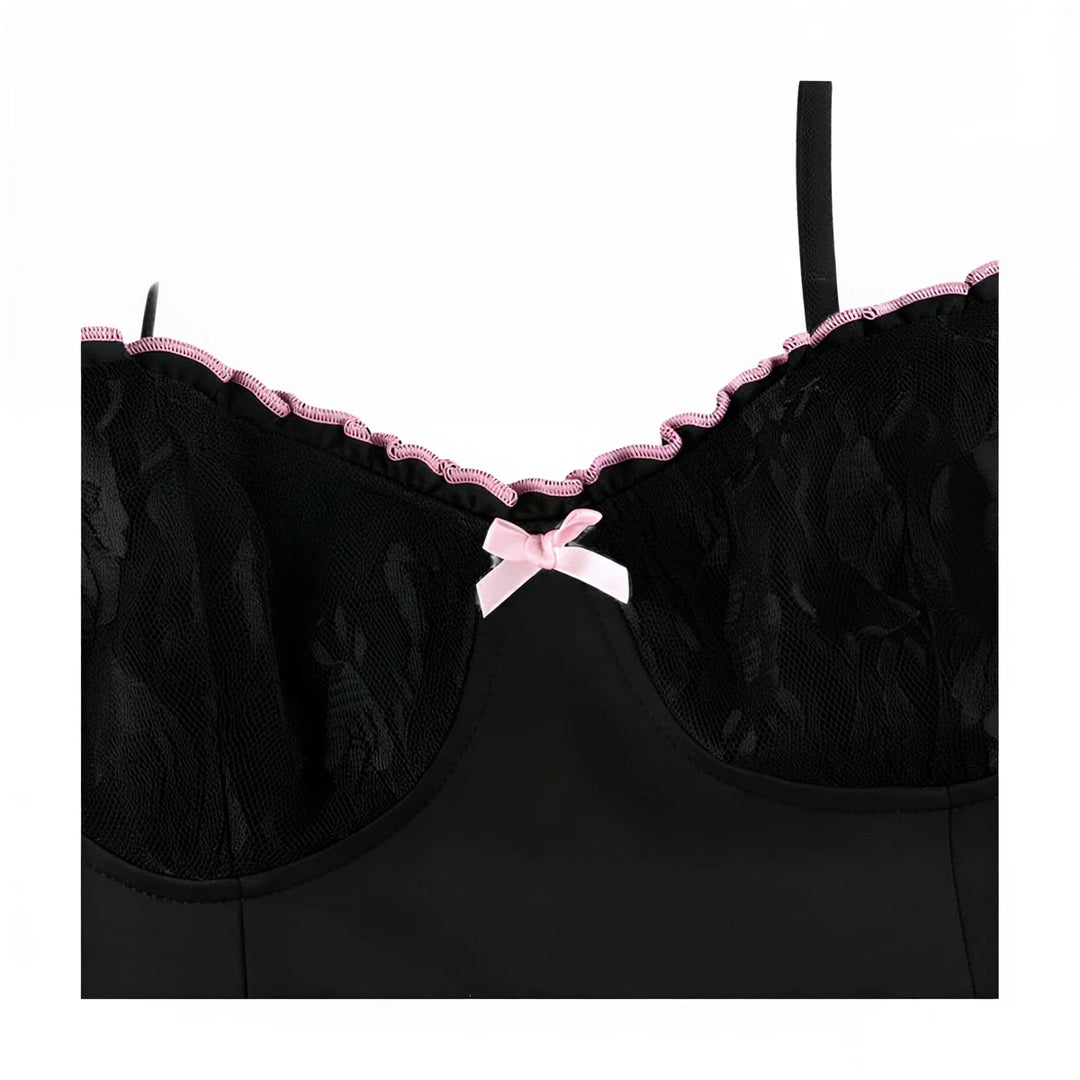 Black lace sundress with pink trim and bow detail at neckline.