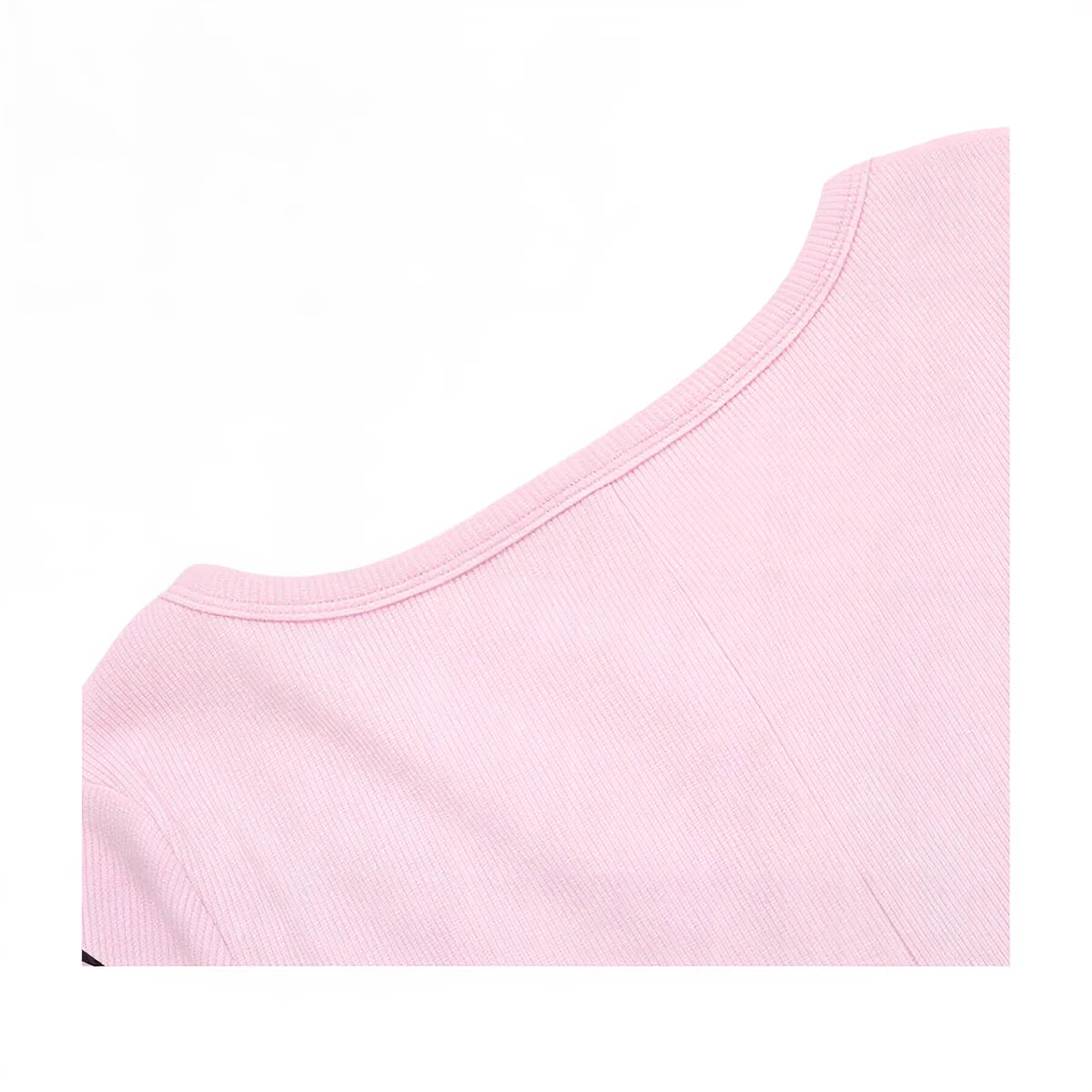 Pink ribbed playsuit with round neckline and fitted sleeveless design.