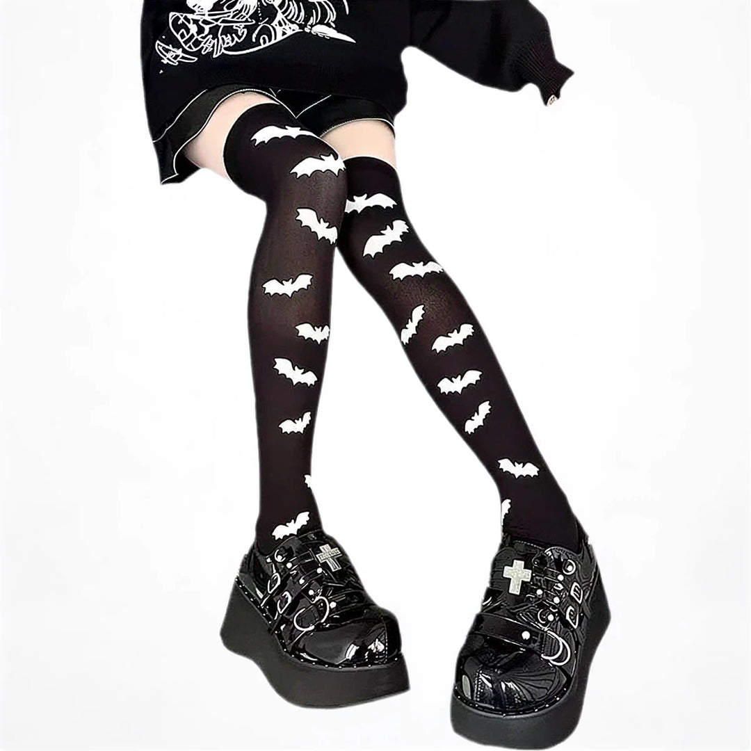 Black bat-patterned sheer stockings with white bat motifs.