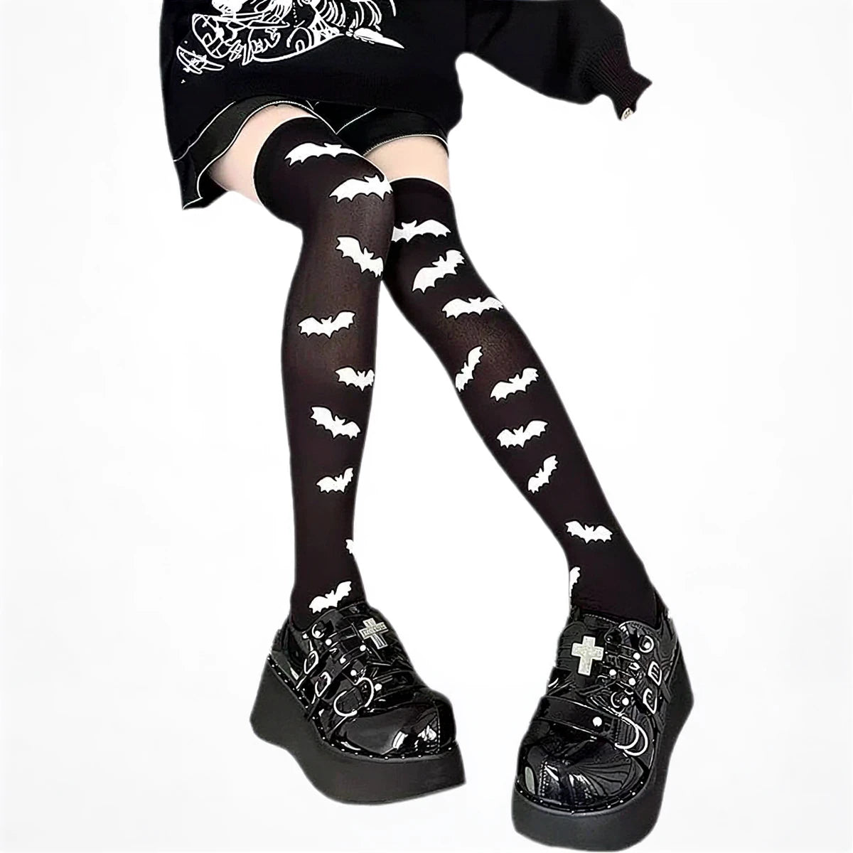 Black bat-patterned sheer stockings with white bat motifs.