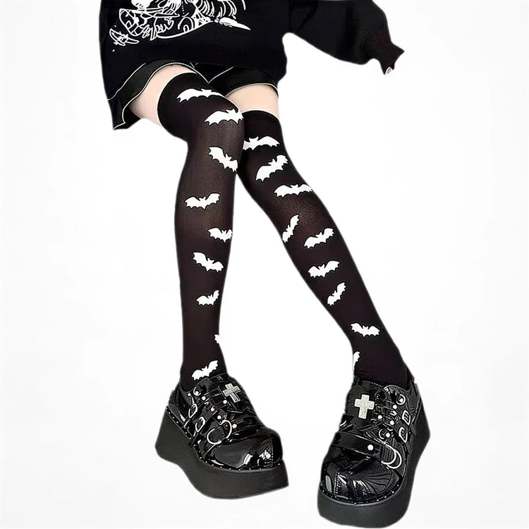 Black bat-patterned sheer stockings with white bat motifs.