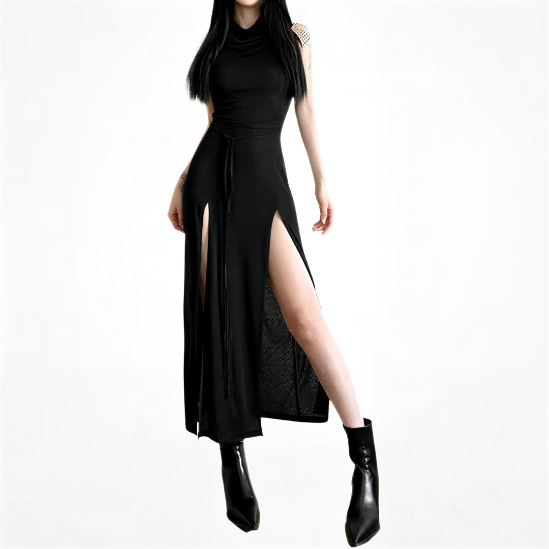 Black dress with high slit, drawstring waist, and sheer mesh panel.