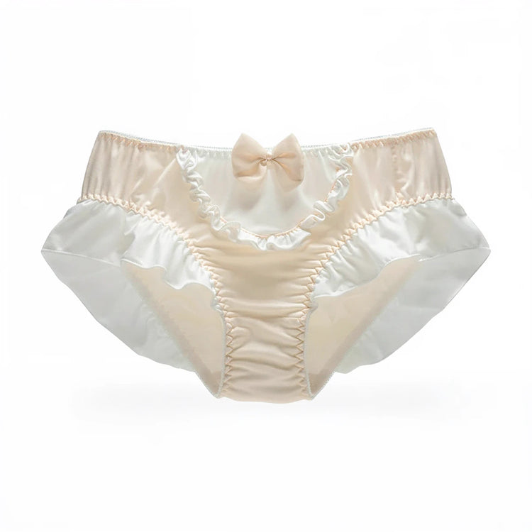 Boudoir Baddie Panties in soft beige with ruffled trim and bow.