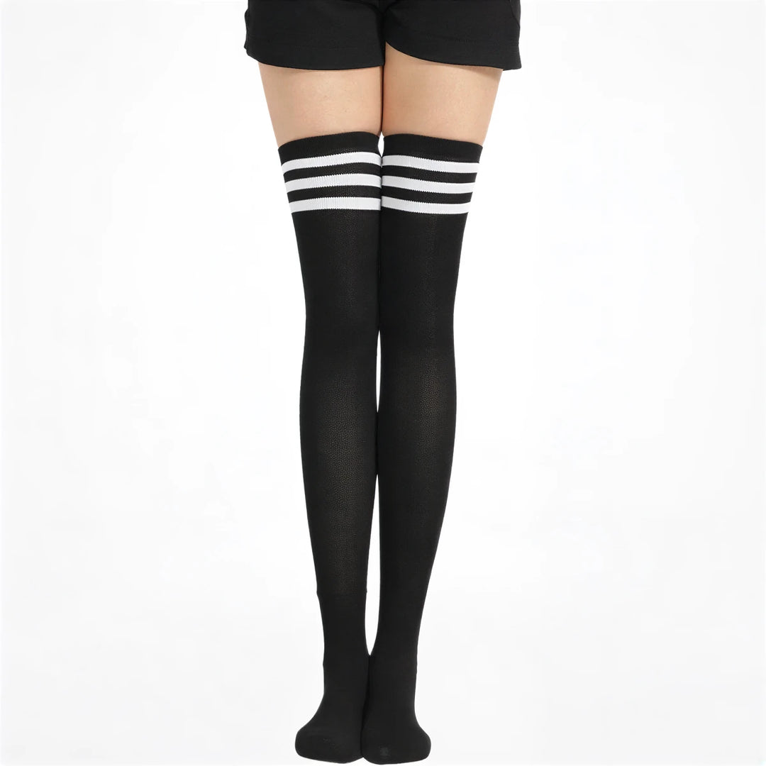 Black knee-high socks with white stripes, ribbed knit material.