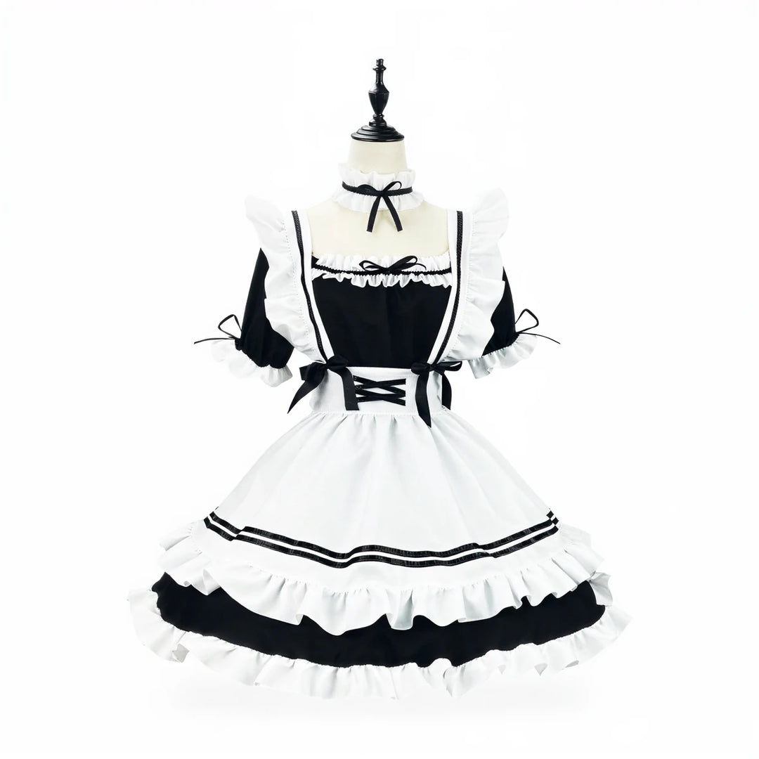 Japanese maid costume in black and white with ruffles and bows.