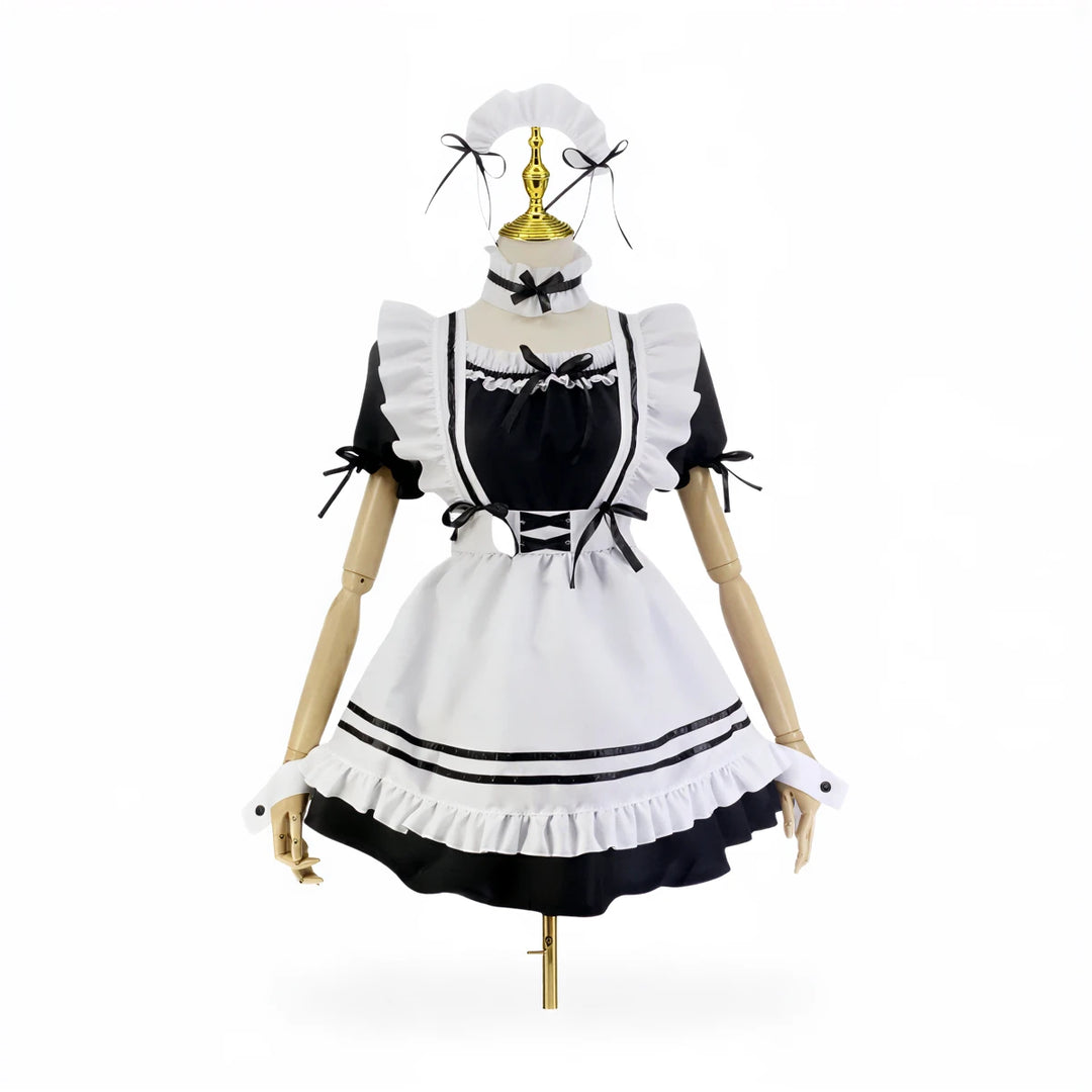 Japanese maid costume in black and white with ruffles and bows.