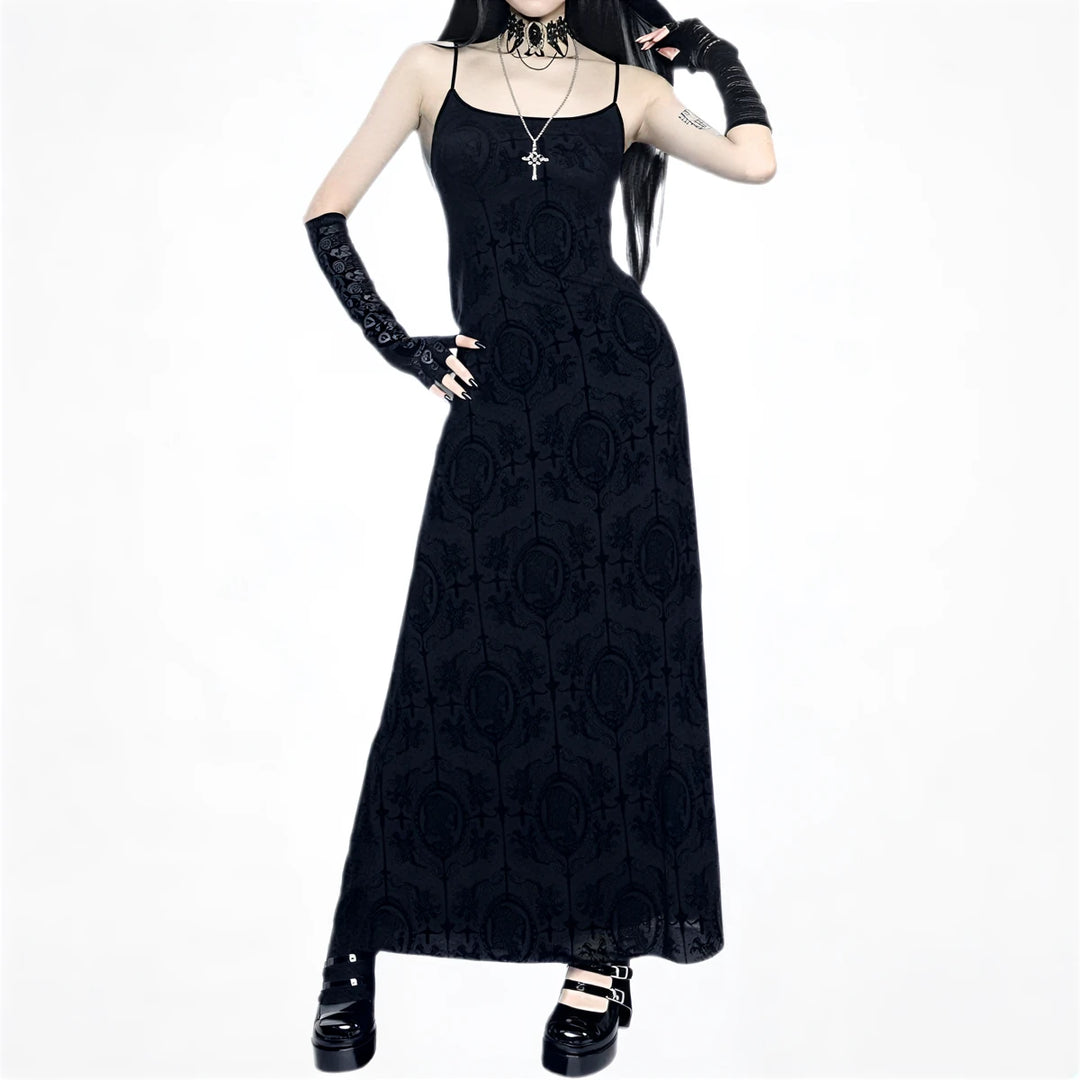 Black lace dress with cross pattern and thin straps.
