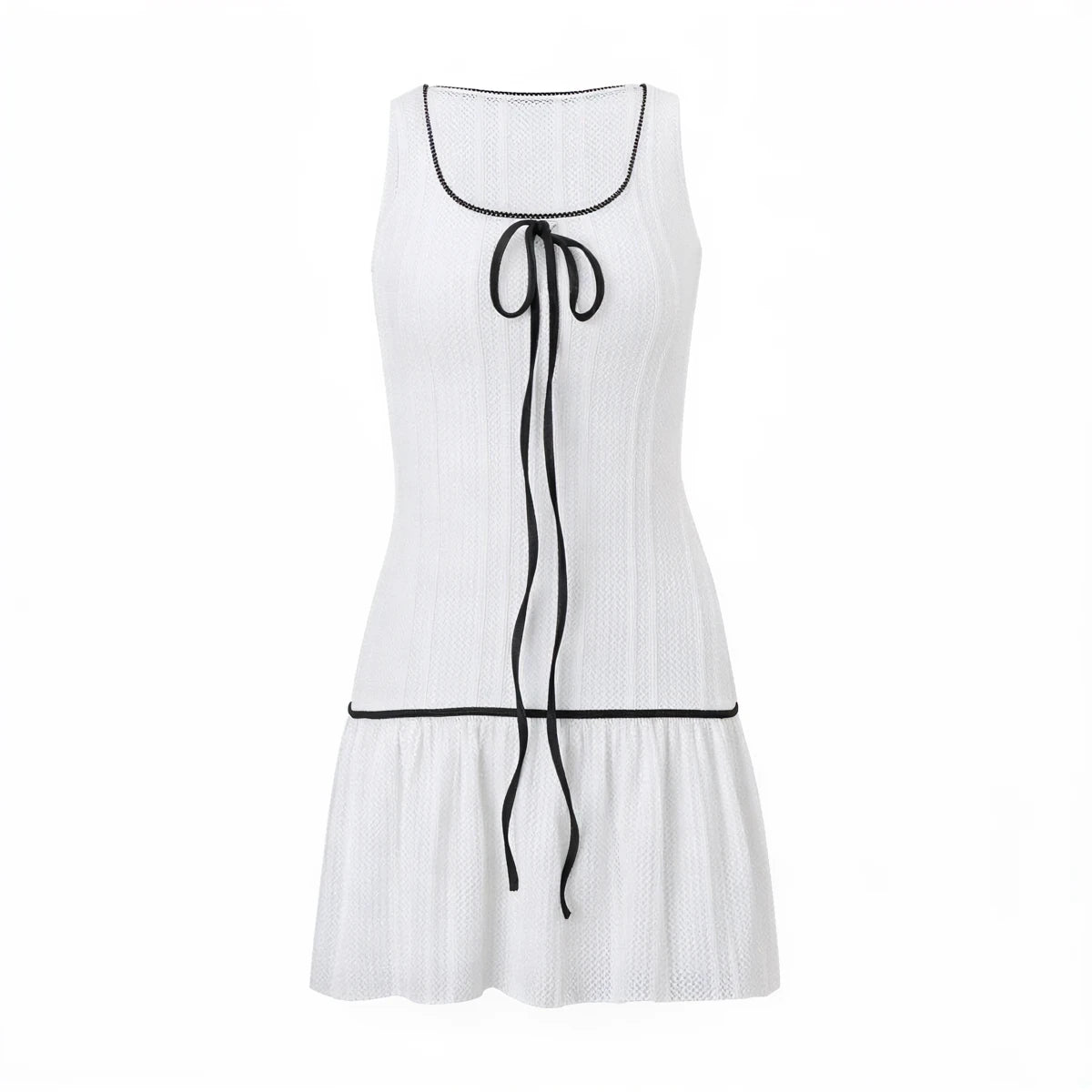 White knit sleeveless dress with black trim and tie-front detail.