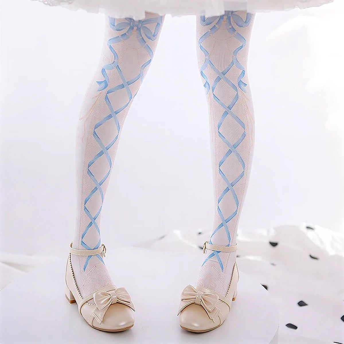 Dollhouse Darling Pantyhose: light blue ribbon crisscross pattern on sheer white fabric.