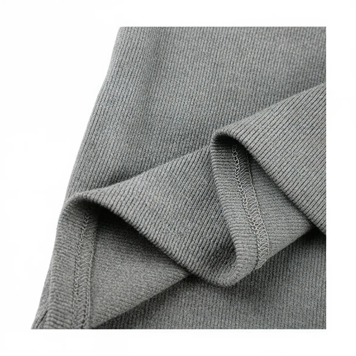 Grey ribbed knit zip-up dress with subtle seam detailing.