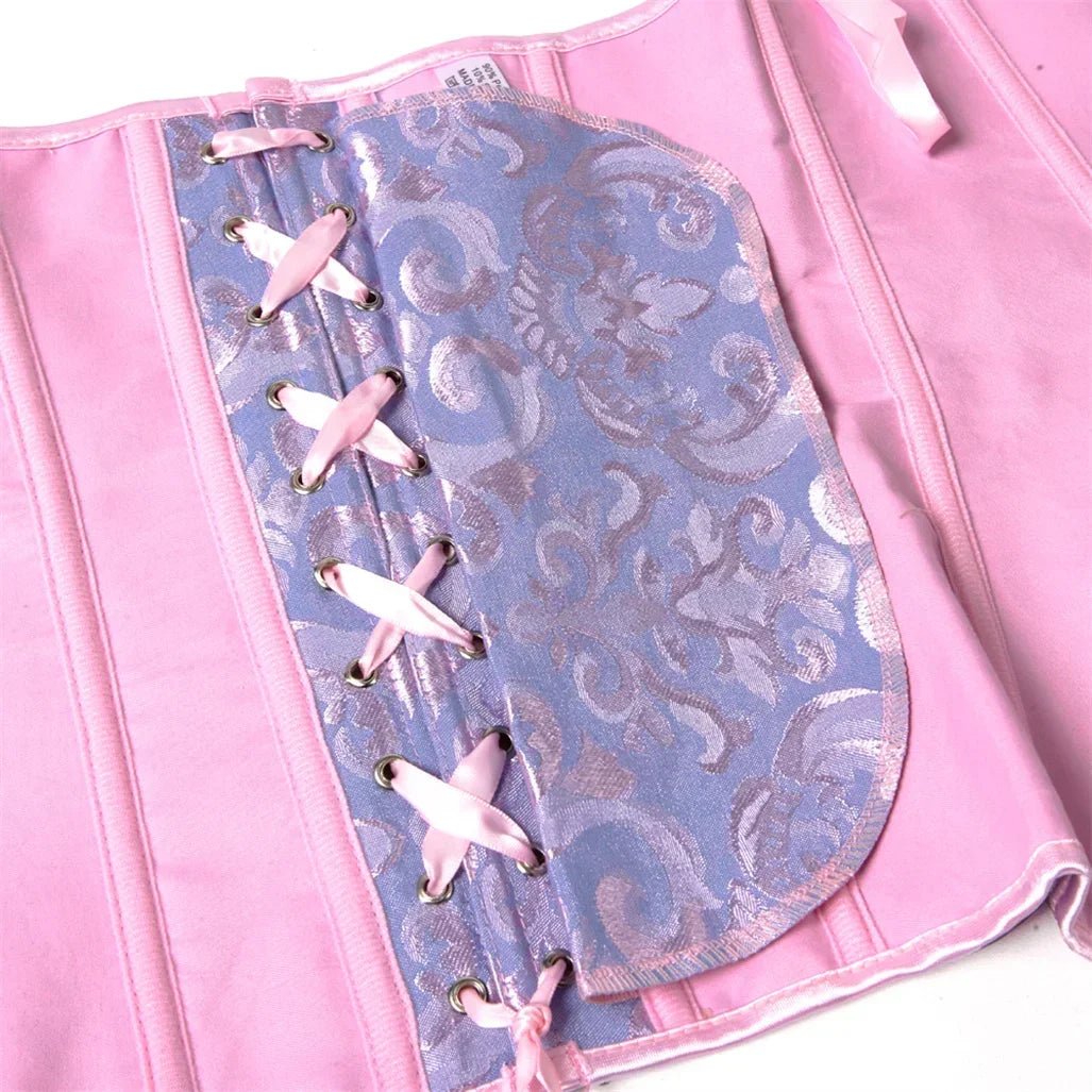 Pink and blue patterned corset with lace-up front and satin trim.