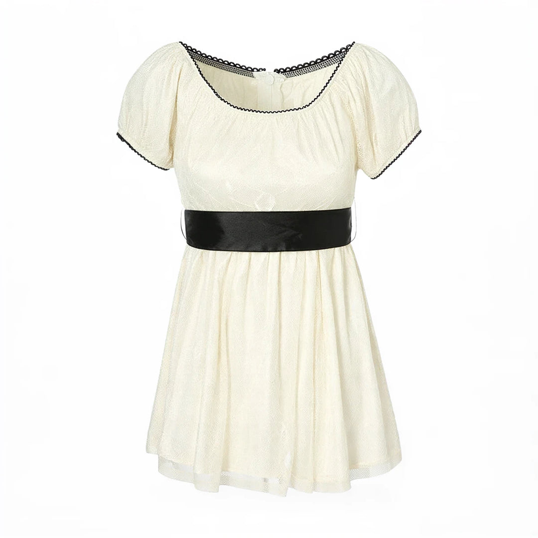 Fairy Hunter lace dress, cream, with black trim and satin waistband.