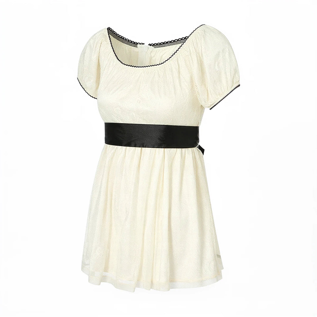 Fairy Hunter lace dress, cream, with black trim and satin waistband.