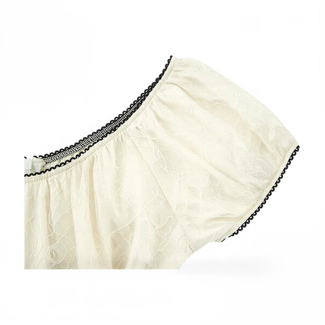 Fairy Hunter lace dress, cream, delicate floral pattern, black scalloped trim.