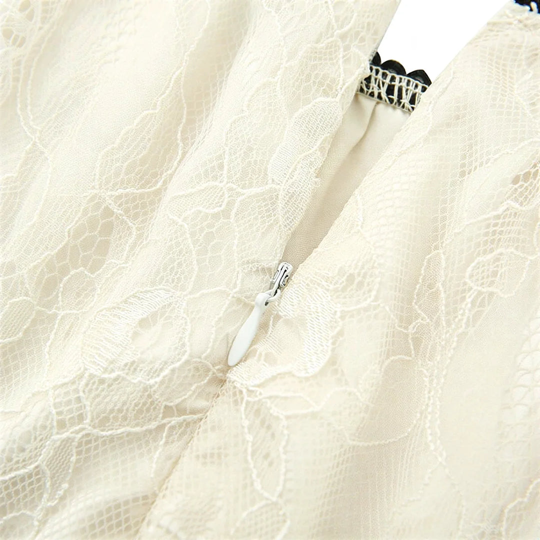 Fairy Hunter Lace Dress in cream, featuring delicate floral lace and a hidden zipper closure.