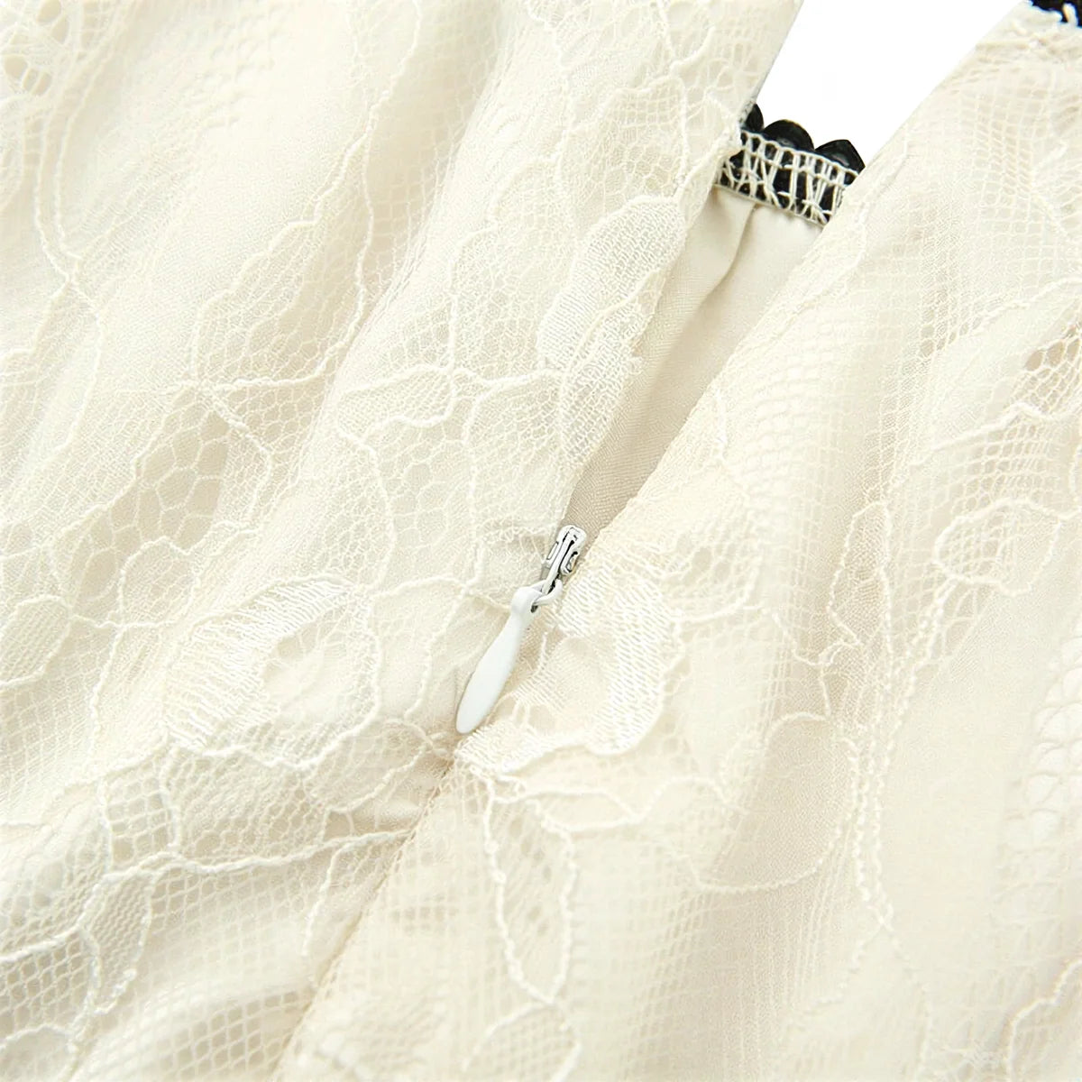 Fairy Hunter Lace Dress in cream, featuring delicate floral lace and a hidden zipper closure.