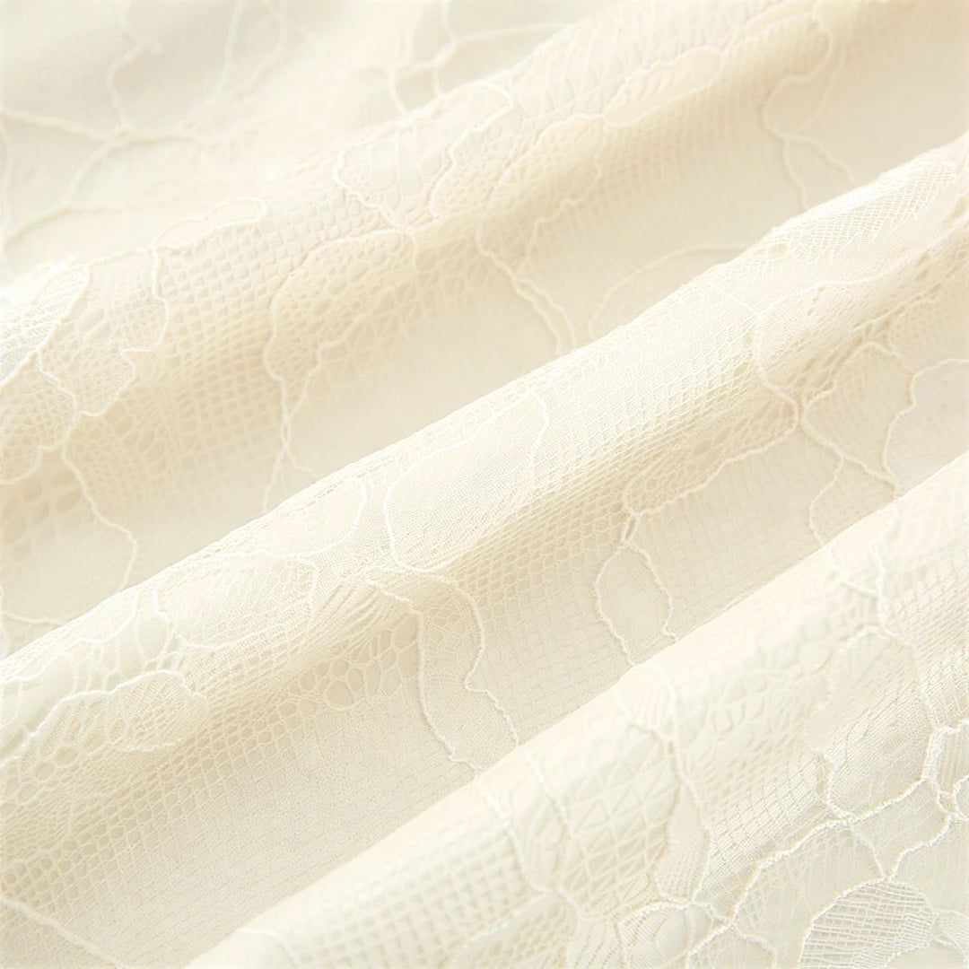 Fairy Hunter lace dress, cream, delicate floral patterned fabric.