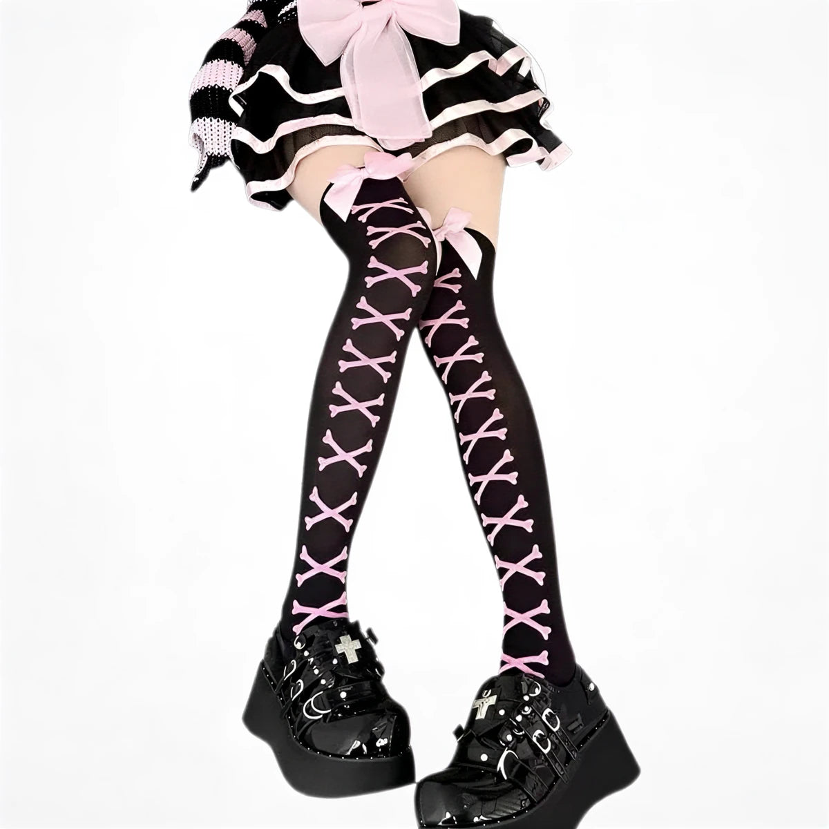 Pink bones patterned thigh-high stockings, black base, sheer fabric with lace-up design.
