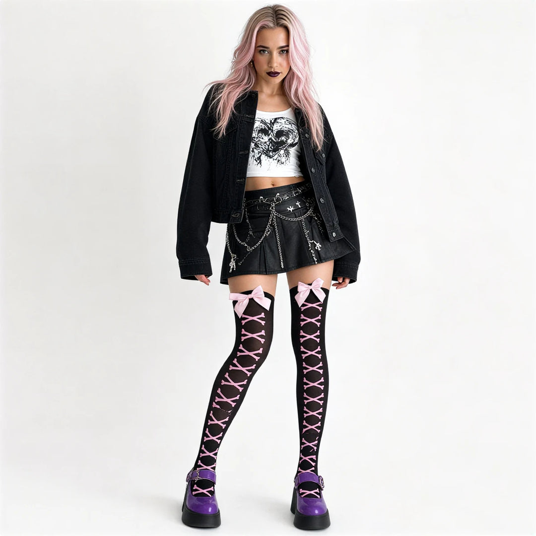 Pink bones patterned thigh-high stockings with lace-up design and bow accents.