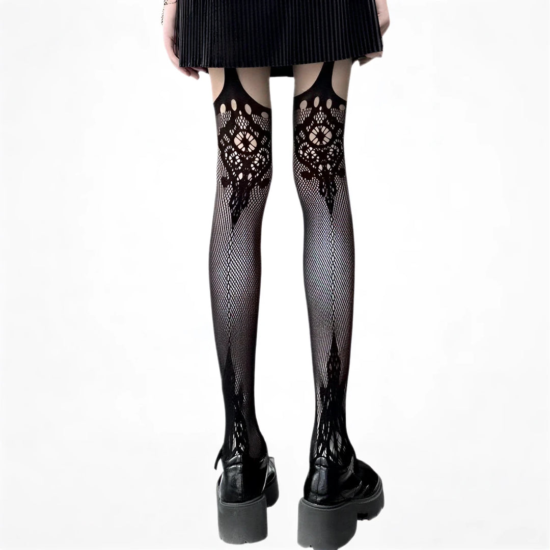 Gothic dark girl fishnet stockings, black lace pattern, sheer mesh material.