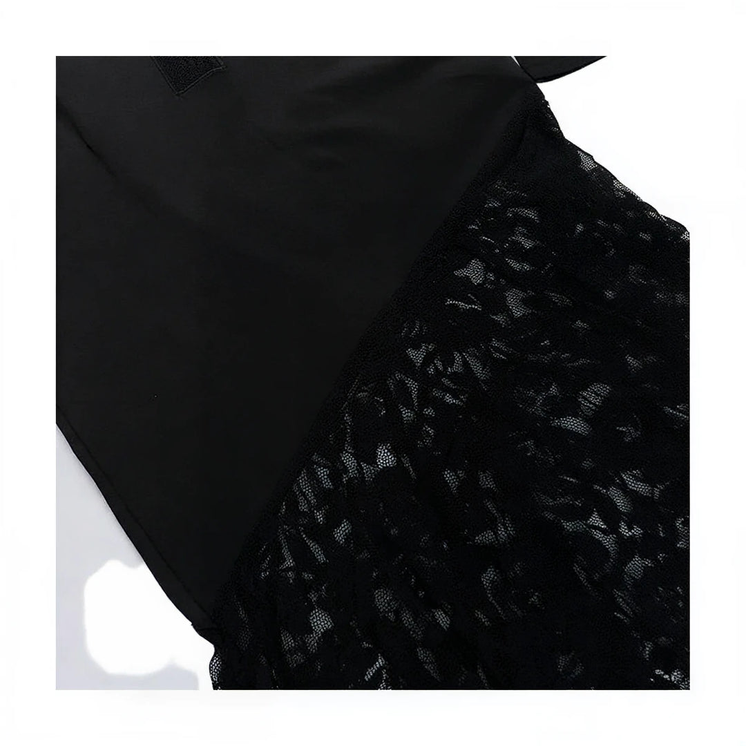 Black lace dress with satin bodice and floral patterned detailing.