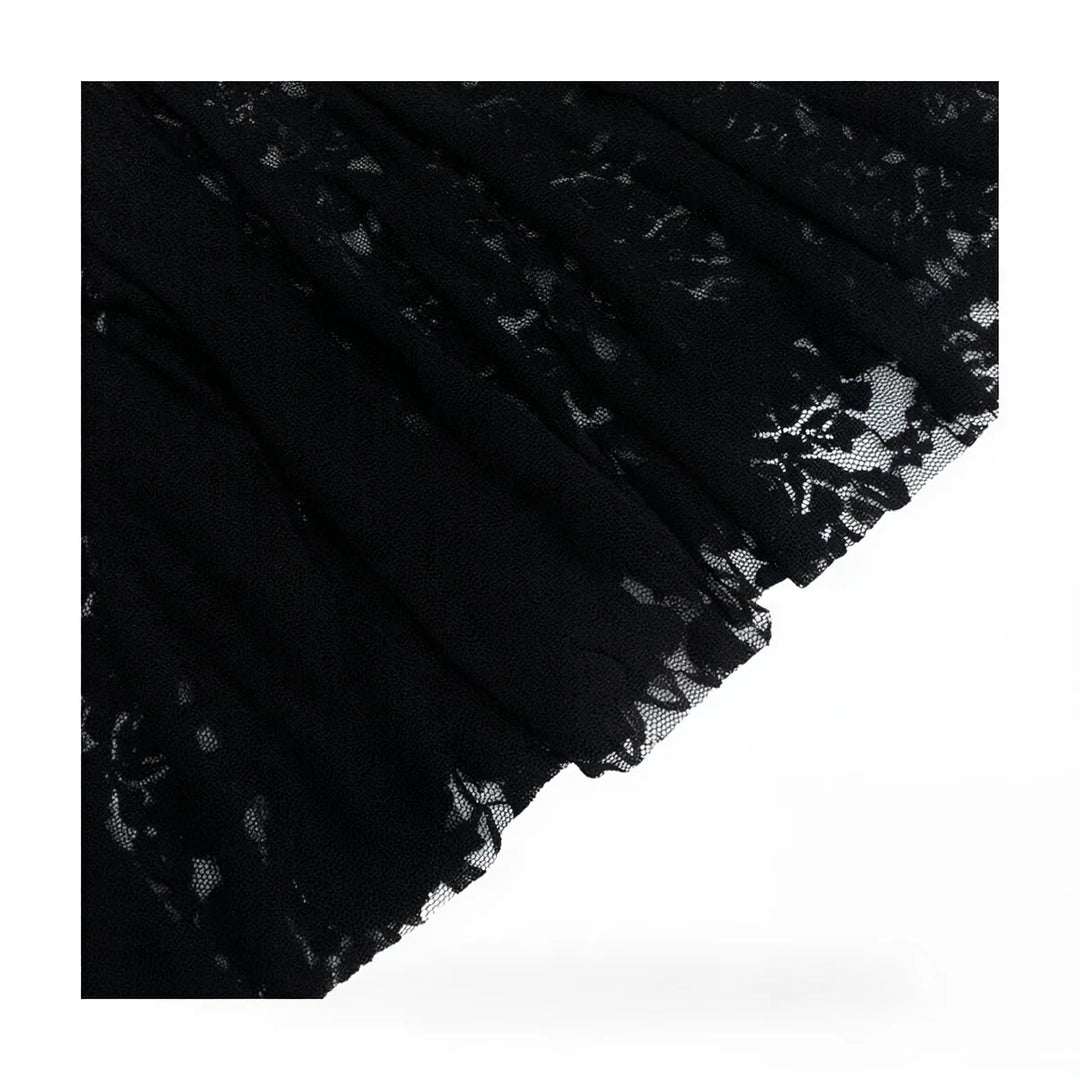 Black lace dress with delicate floral pattern and ruffled hem.