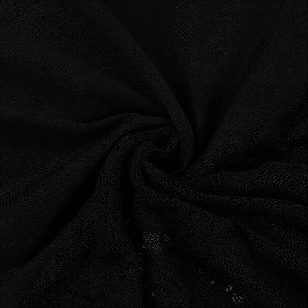 Black lace dress with delicate floral pattern and soft fabric texture.