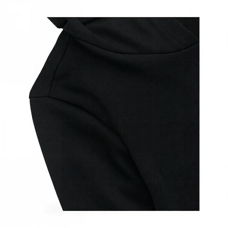 Black dress with structured shoulder seam and smooth fabric finish.
