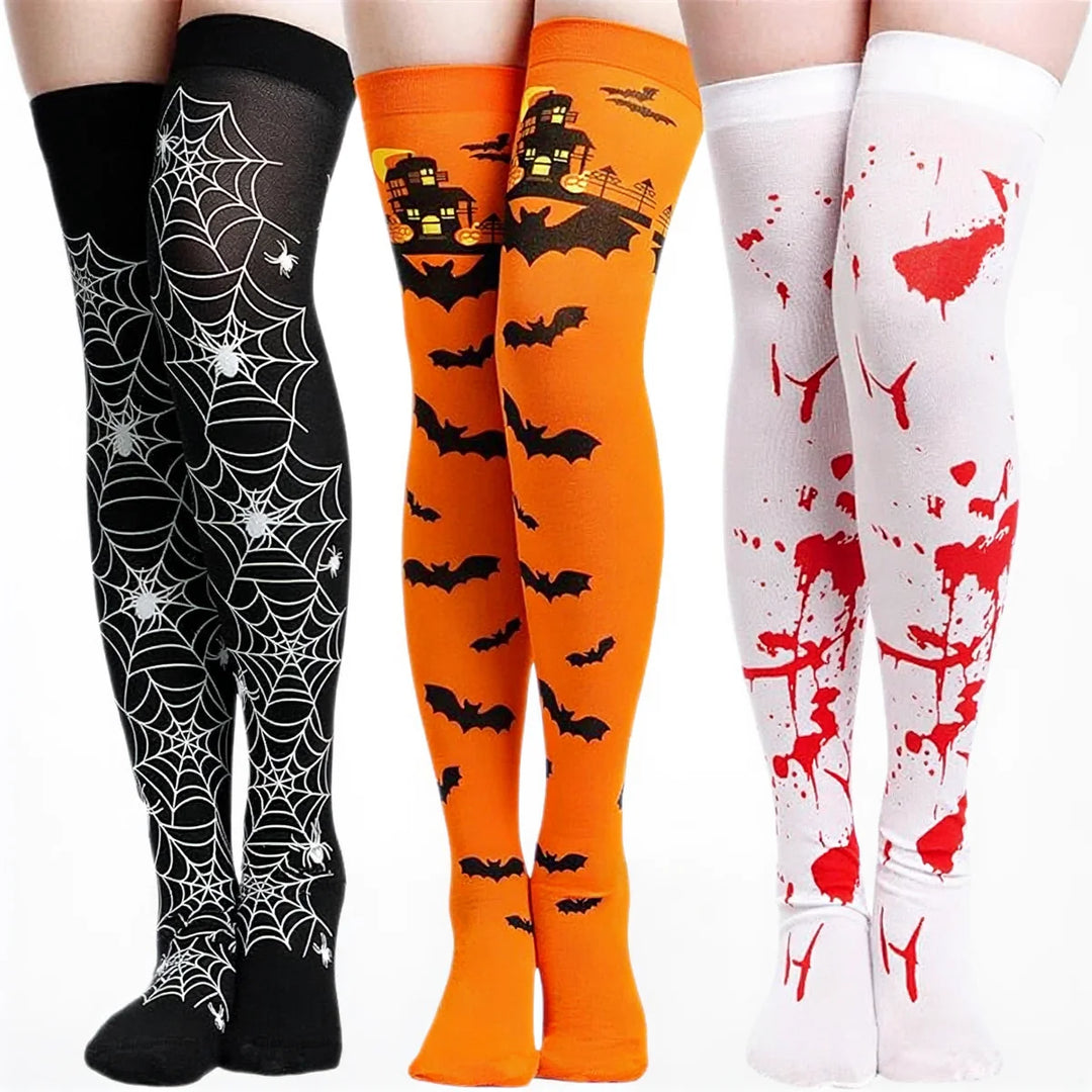 Halloween stockings in black, orange, and white with spider webs, bats, and blood splatter designs.