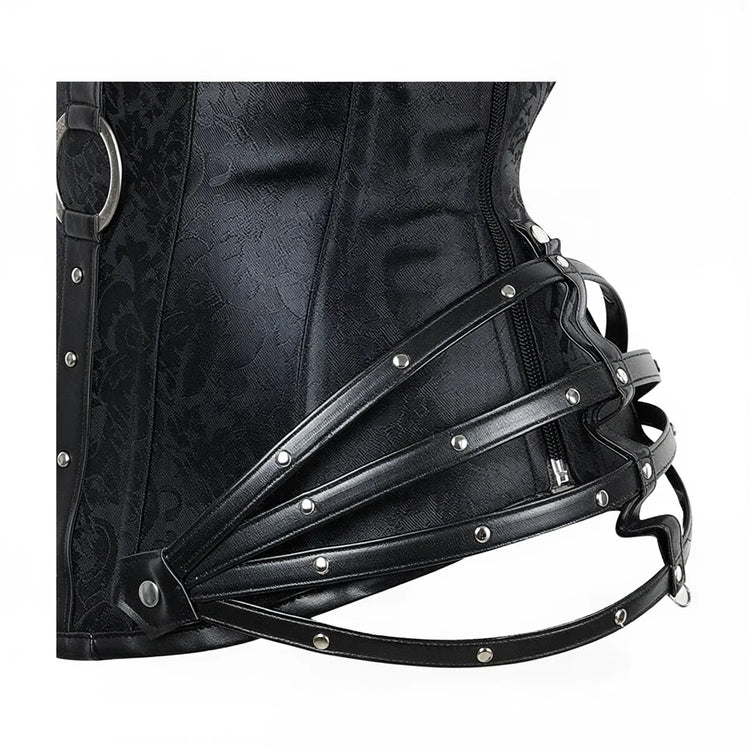 Black lace corset with leather straps and silver rivets.
