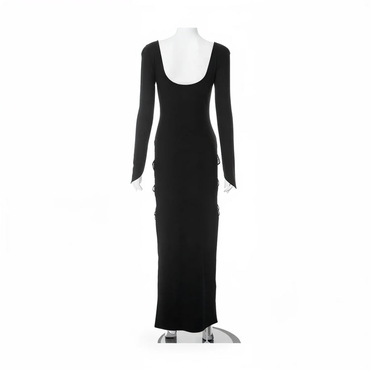 Black long-sleeve mermaid gown with side lacing and square neckline.