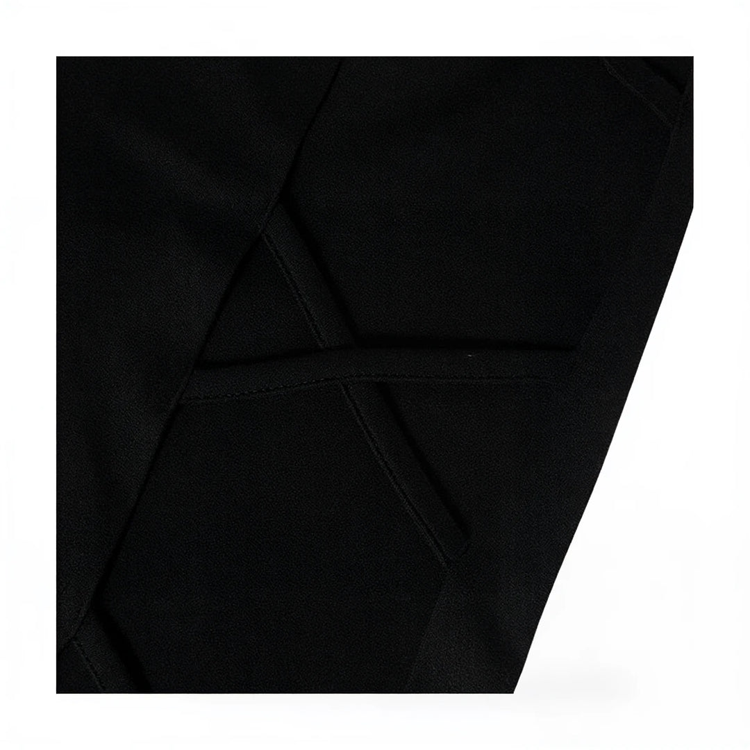 Midnight Mermaid Gown: black satin with geometric seam detailing.