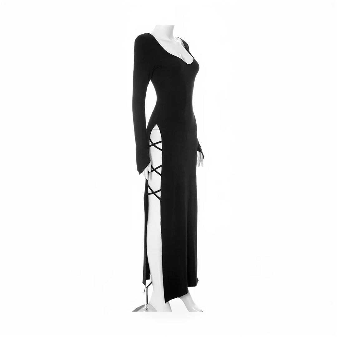 Black long-sleeve mermaid gown with side slit and lace-up detail.
