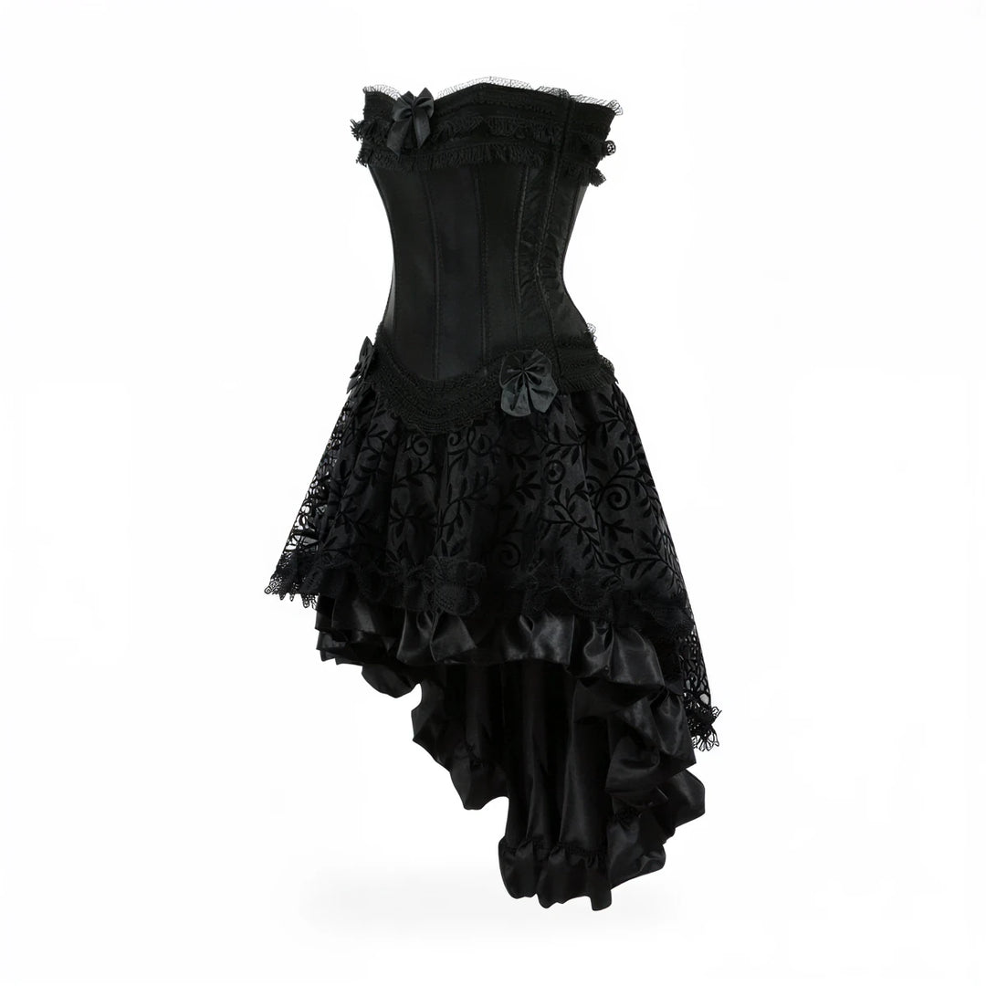 Black corset dress with lace, ruffles, and bows, asymmetrical hem.