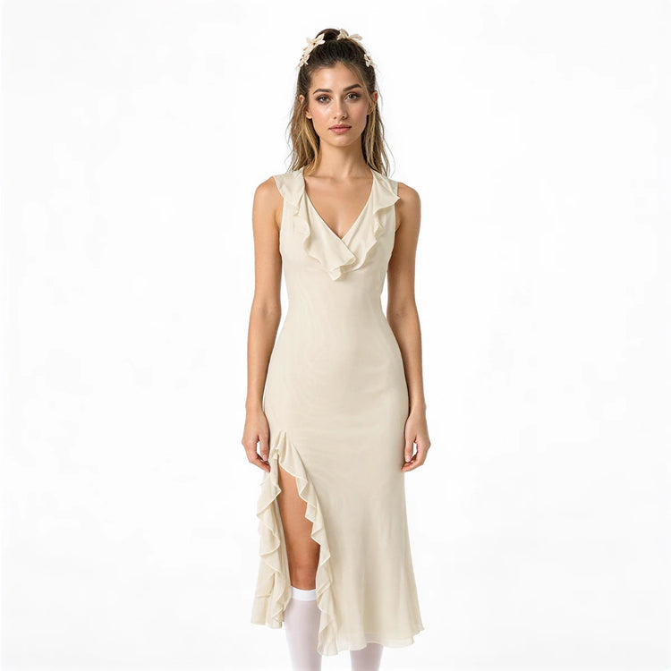 Cream mesh dress with ruffled neckline and asymmetrical side slit.