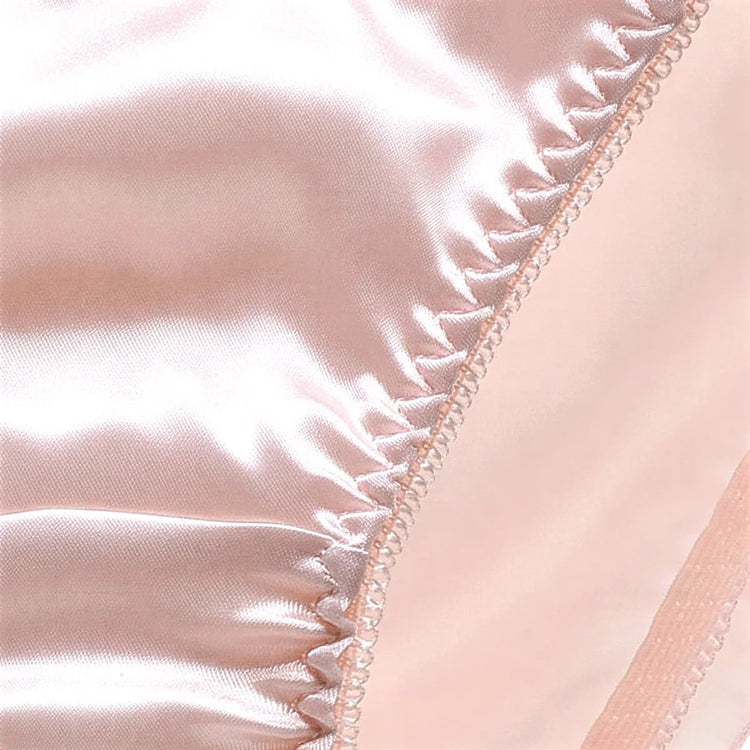 Pink satin panties with delicate scalloped edge trim.