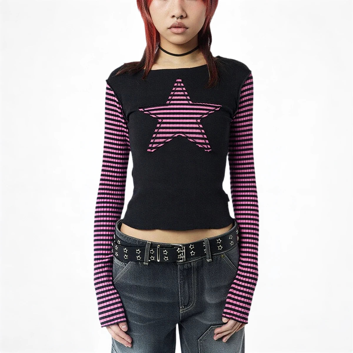 Black long sleeve crop top with pink striped star detail.