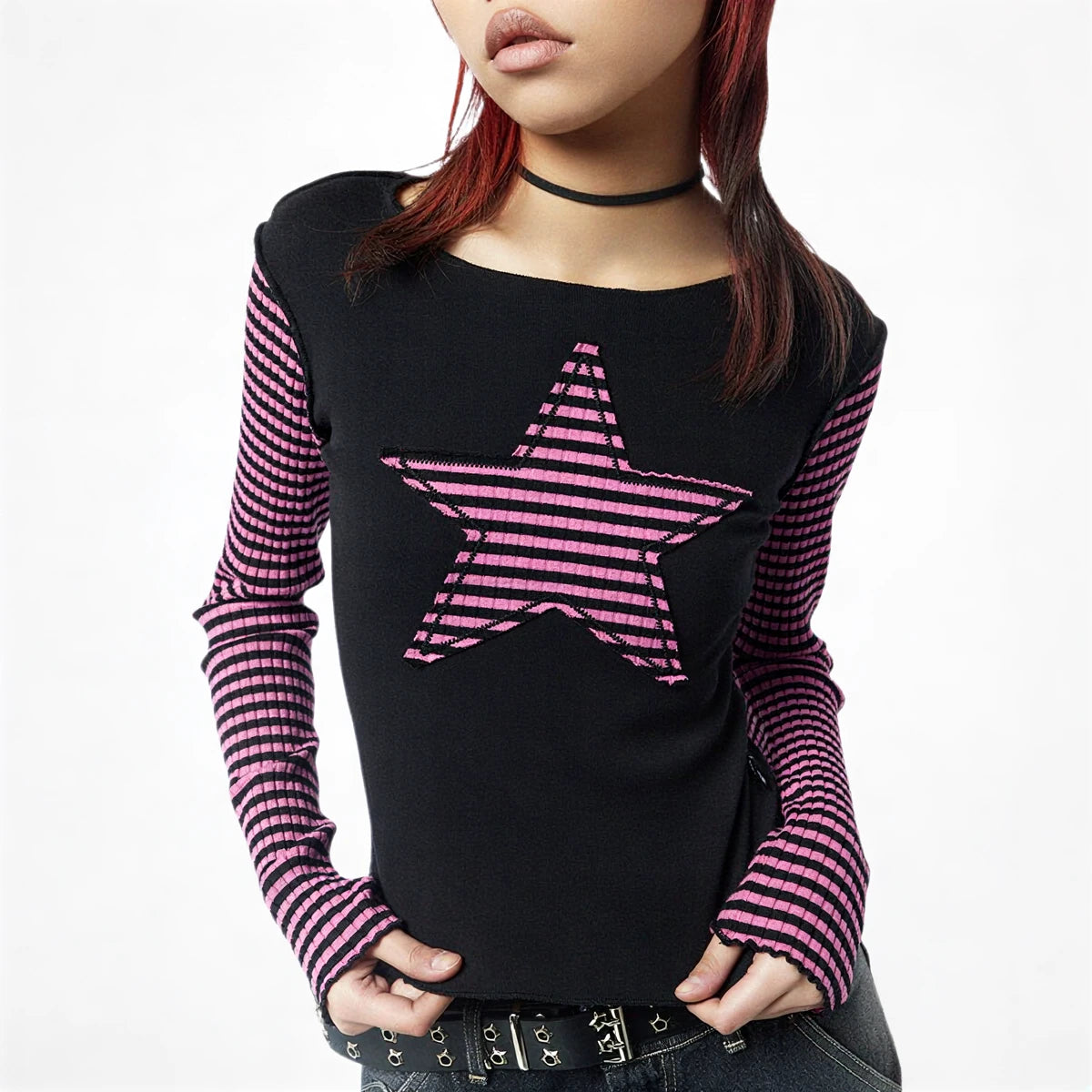 Black long sleeve with pink striped star design on front.