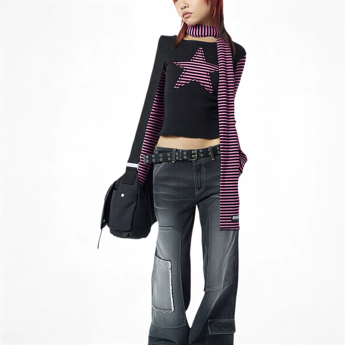 Striped long sleeve crop top with star print, black and pink, knit material.
