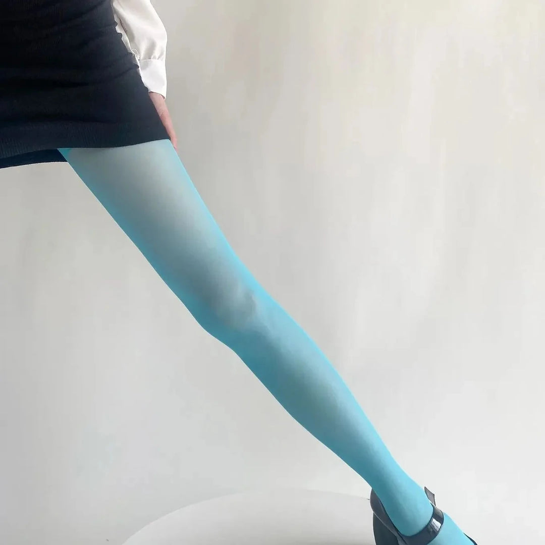 Vibe Legwear: sheer light blue tights with smooth finish and subtle gradient effect.
