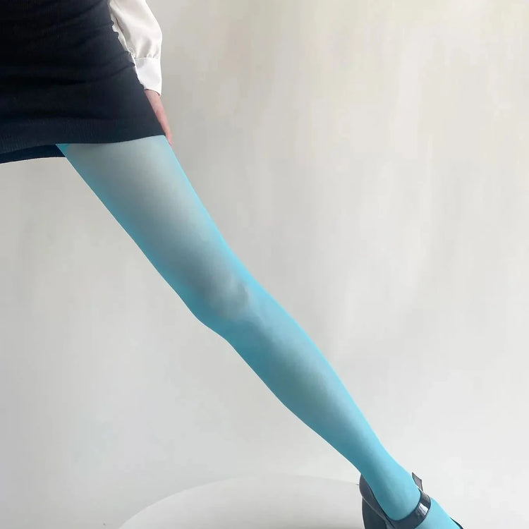 Vibe Legwear: sheer light blue tights with smooth finish and subtle gradient effect.