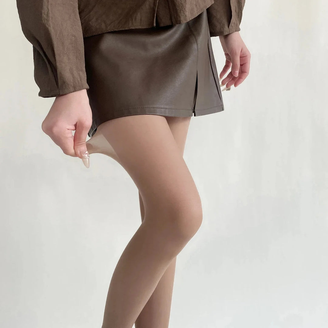 Vibe Legwear: sheer nude tights with smooth texture and subtle sheen.