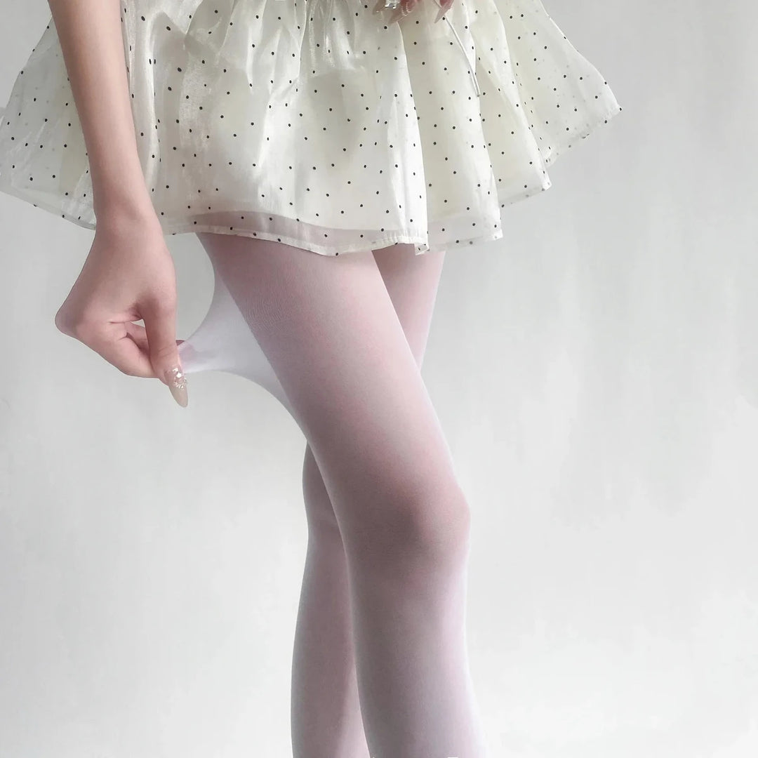 Vibe Legwear: soft pink sheer tights with smooth texture and subtle sheen.