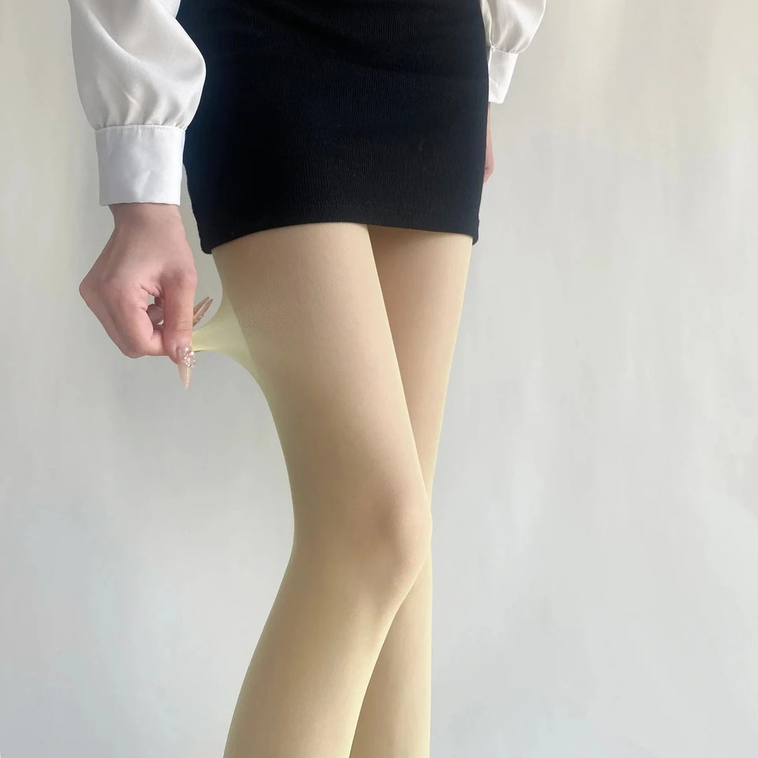 Vibe Legwear: beige sheer tights with smooth texture and natural fit.