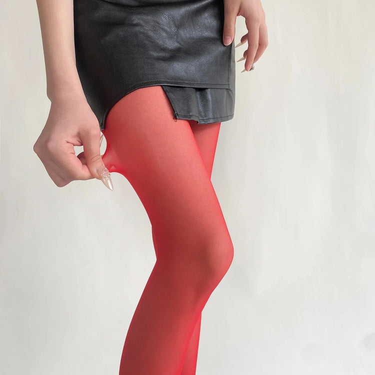 Vibe Legwear: bold red sheer tights with smooth, stretchy fabric and subtle sheen.